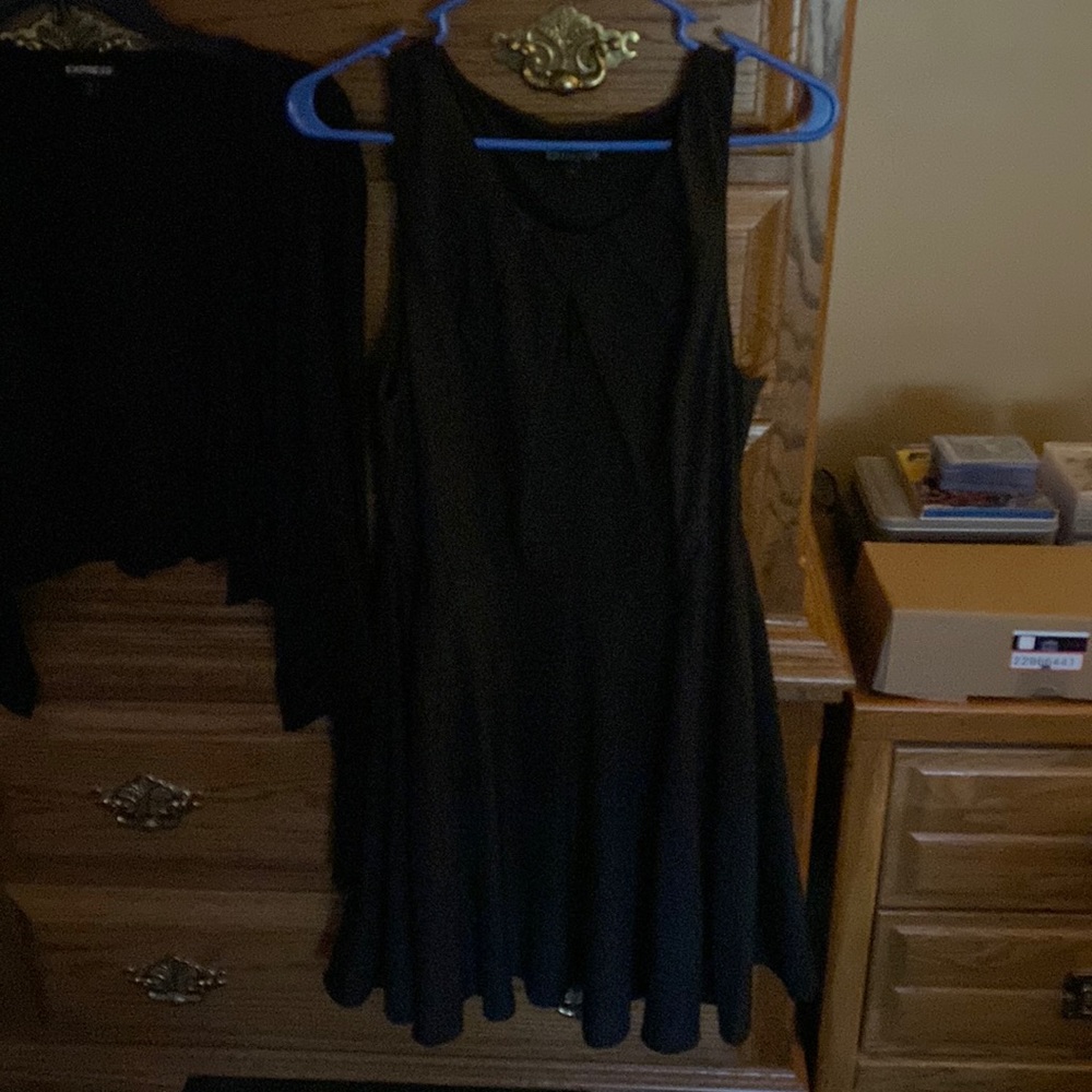 Black Dress Black Cami. dress comes right above the knee and cami is a mid cover